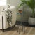 Introducing the arkan drink table in a stunning green. Featuring a sleek design crafted from marble and metal, this table...