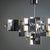 A large chandelier by renowned designer Gaetano Sciolari, made in Italy during the 1970s. This large chandelier features a...