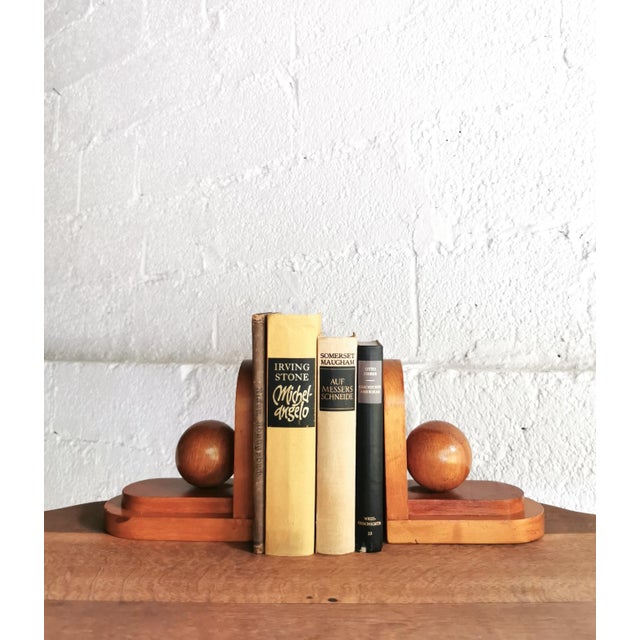 These minimalist bookends were manufactured by LSM in the 1930s/1940s from beech wood and their straight lines are...