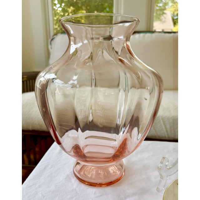 Vintage 1930’s Pink Depression Glass Vase A classic Depression-era vase in soft pink pressed glass, featuring concentric...