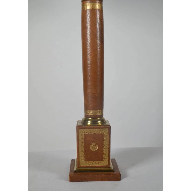 Empire Style brass-mounted Tooled Leather Table Lamp, 20th century columnar standard on pedestal with guilloche gilt...