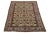 An antique Persian Mahal rug featuring a tan-beige field with blue and rust accents showcases an all-over pattern. This...