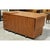 Finished in a warm medium wood veneer, this piece features an expansive work surface with fold-out extensions and a...