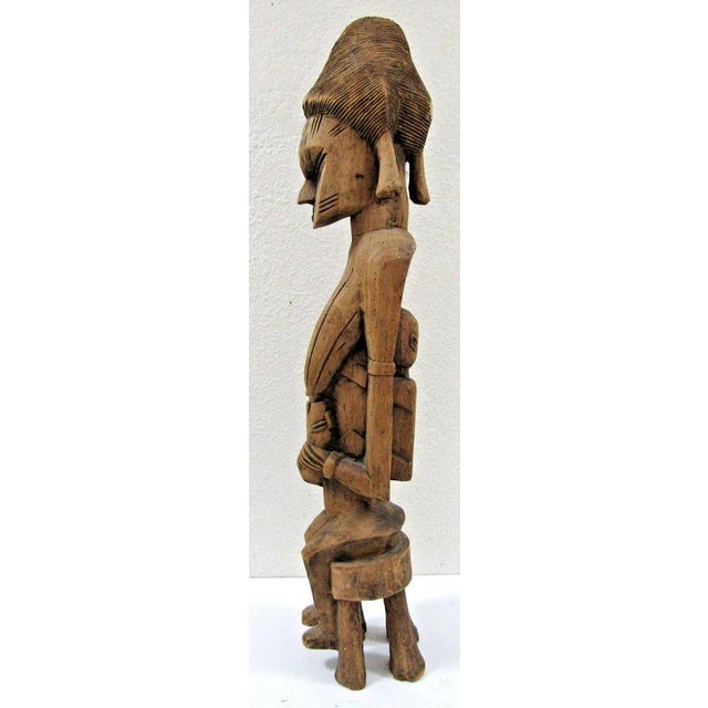 Antique African Hand-Carved Wooden Dogon Maternity Sculpture from Mali Measures 4 1/2" wide, 5 1/2" deep and 28" tall....