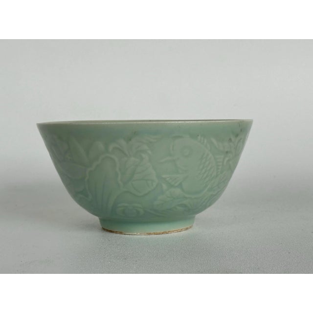 For your consideration: Small Celadon bowl Textured Stamped at the bottom