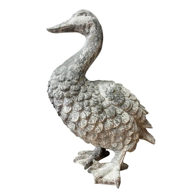 Bring timeless charm to your home or garden with this delightful vintage cast iron duck statue. Masterfully crafted with a...