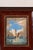 Original seascape watercolor presented in a cherry-hued oak frame. Soft washes of color and coastal subject matter create...