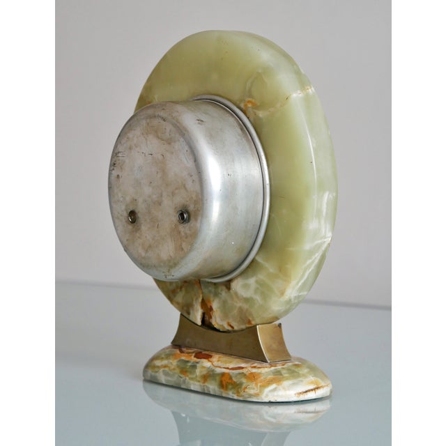 Beautiful art deco onyx clock. Combination of onyx, chrome and brass.