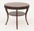 Barbara Barry Attributed Mahogany Circular Table, with fluted apron above circular undertier on four cabriole legs. 30.25"...