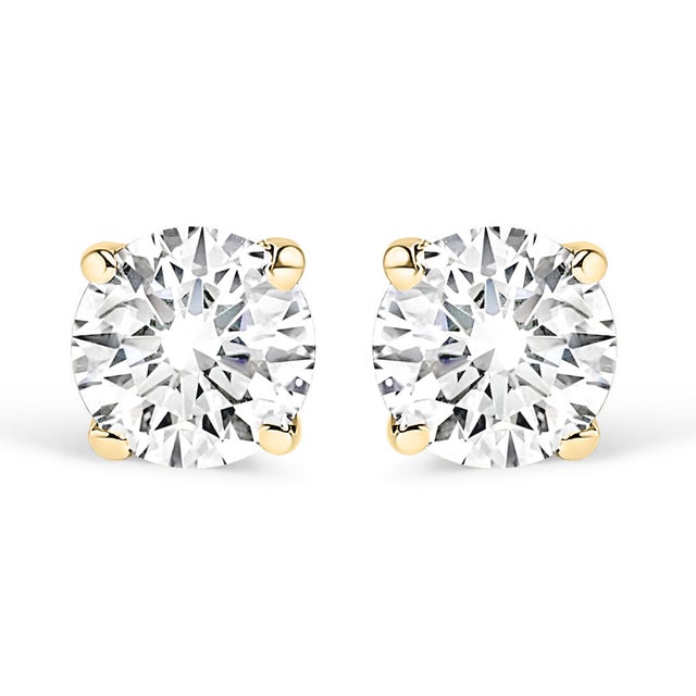 A timeless jewelry essential, these white diamonds studs will bring unparalleled sparkle to your ears. These elegant lab...