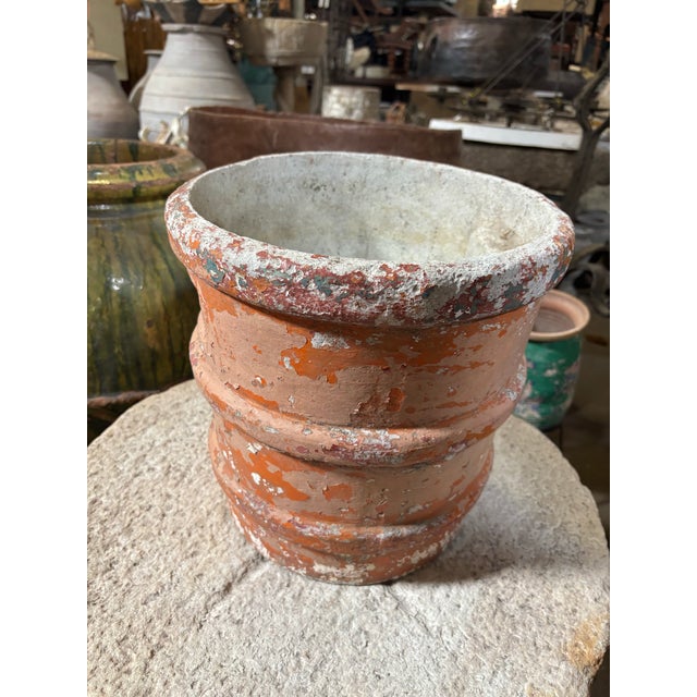 A European Red Colored Planter Made of Fiber Cement, From the Mid 20th Century. This planter is a versatile size and has a...