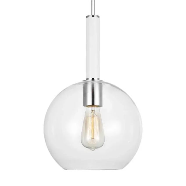The Monroe round pendant is inspired by graphic enameled metal jewelry and decorative accessories from kate spade with a...