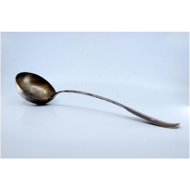 Plain Silver Soup Ladle with Handle, in Very Good conditions. Designed before 1890 This piece has an attribution mark, I...