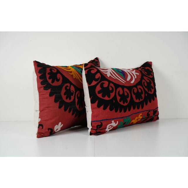 Uzbek Suzani Pillow Cover Elevate your home decor with our Turkish Suzani Pillow Cover, featuring exquisite vintage Uzbek...