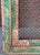 This antique architectural window frame features hand-carved floral corners, a vibrant distressed green patina, and an...