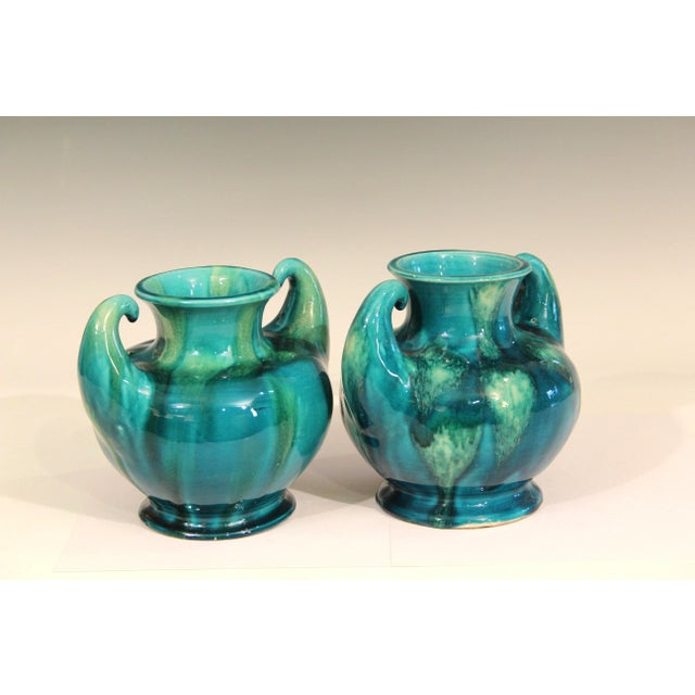 Pair Awaji Pottery "muscle" vases in Art Deco form with outstreched handles and frothy blue green flambe glaze, circa...