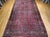 This vintage oversized Persian Sarouk rug is a radiant example of timeless floral artistry and superior craftsmanship....