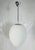 Iconic “Uovo” pendant light designed in 1972 by Ben Swildens for the renowned Italian lighting house Fontana Arte. This...