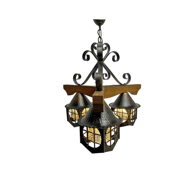 What a charming pendant lamp. It was made in Germany in the 1960s–1970s and consists of a wooden frame with wrought-iron...