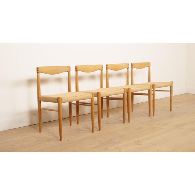 Set of 4 beautiful vintage dining chairs from Denmark, designed by H.W. Klein for Bramin. These stylish Danish design...