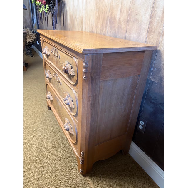 Antique Victorian era chest of drawers or 3 drawer dresser from the 1875-1890's. This beautiful chest has burled wood...