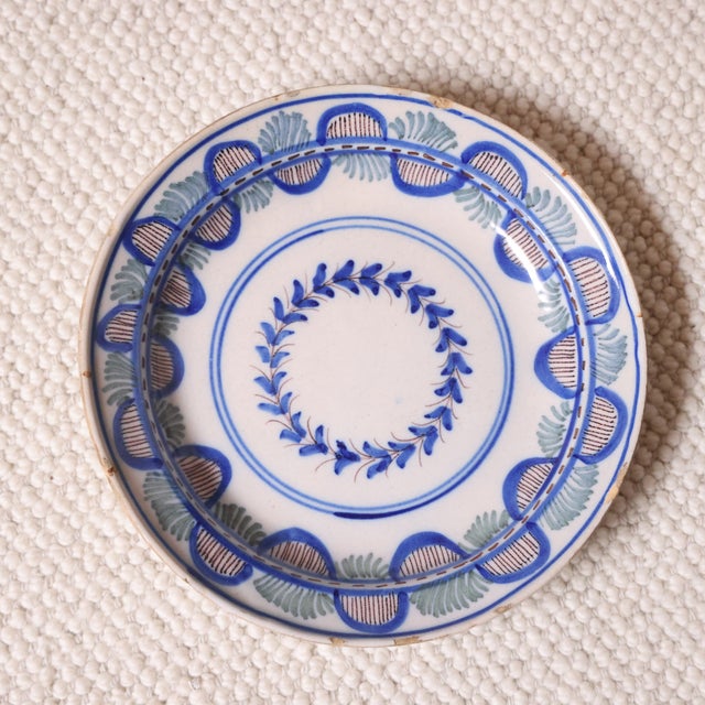 Add timeless Mediterranean charm to your collection with these 19th century Spanish pottery plates, beautifully...