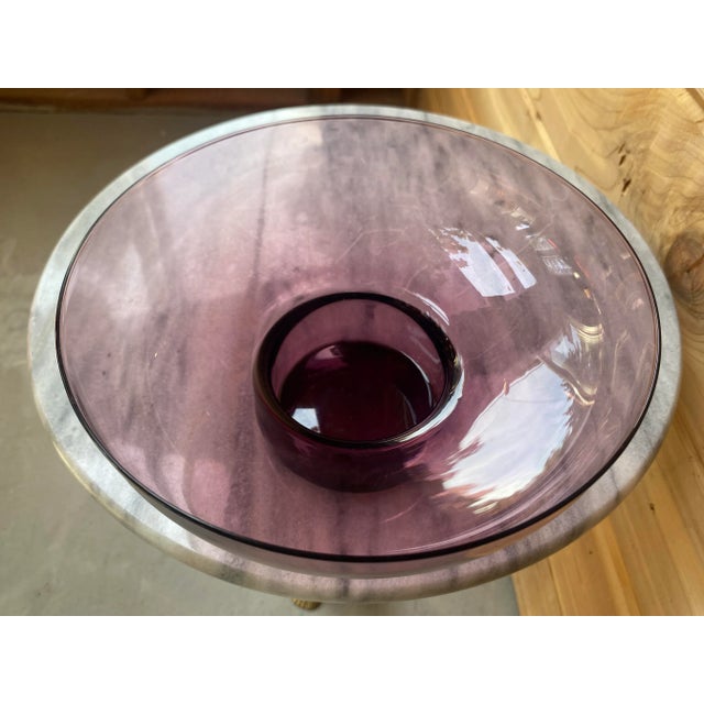 An elegant, thin mid century glass serving bowl, in the style of Blenko, with a lovely amethyst color.