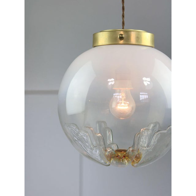 Lamp's cover is made of genuine brass material complementing this vintage item nicely with it's golden colour. total...