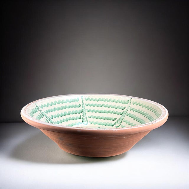 Large Spanish handmade and painted white and green glazed terracotta "Lebrillo" earthenware bowl in the style typical of...