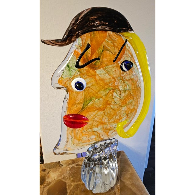 Unique, glass handblown head Paperweight, a head sculpture that is a nice piece of the collection and a breathtaking...