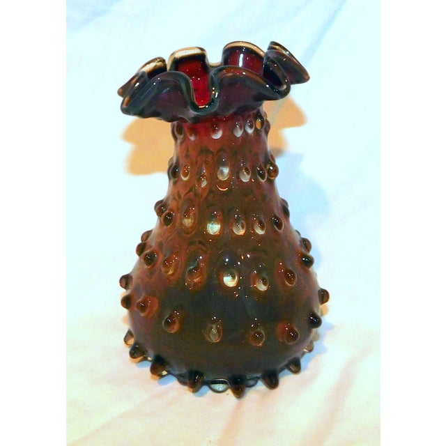 Fantastic Empoli glass vase in red-to-amber transitional glass, ruffled rim and hobnails. The neck seems to have fallen a...