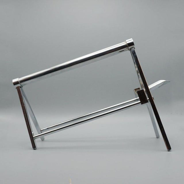 An art deco modernist wine pourer designed by jacques adnet (1900 - 1984). Chrome plated metal. Dimensions: h 22.5cm w...