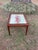 This beautiful table is handcrafted and most likely one of a kind. The table top is a large framed needle point of...