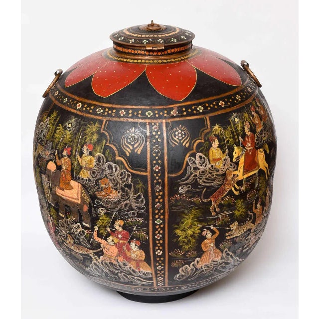 The piece is fashioned with royal figures atop elephants and horses, as well as tiger hunting scenes. An outstanding 19th...