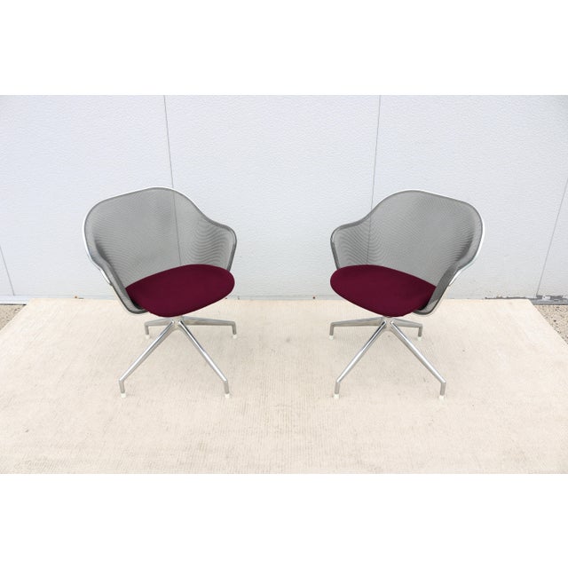 Fabulous pair of Iuta swivel chairs designed by Antonio Citterio for B&B Italia in 2000. The Iuta chair is characterized...