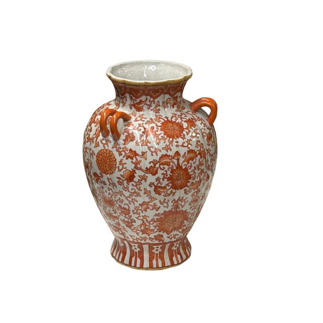 This striking ceramic vase features a lobed, baluster-style body decorated with a vibrant iron-red /orange red floral...