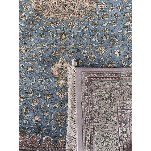Beautiful Ghom silk oriental rug, hand-knotted steel blue bright color motif