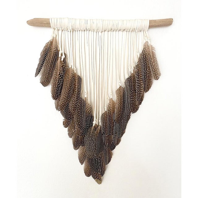 The Gilded Apex Kristen Leigh Baker | 2025 Medium: Ethically sourced hand selected feathers, natural weathered driftwood,...