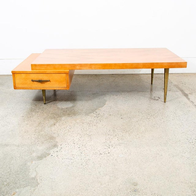 Refinished mahogany table by "Mansion House" C 1965. Comes with a single drawer and cast brass legs. Marked with the model...