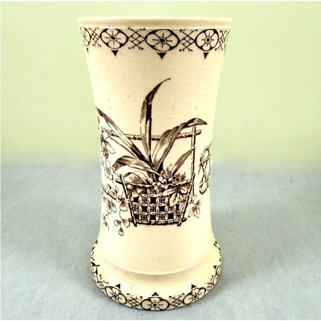 An ironstone toothbrush holder in the Aesthetic Taste, made by Bridgwood and Clarke at The Churchyard Pottery Works –...