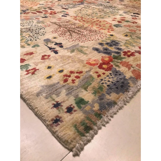 This unused rug is handwoven in wool on a cotton frame.