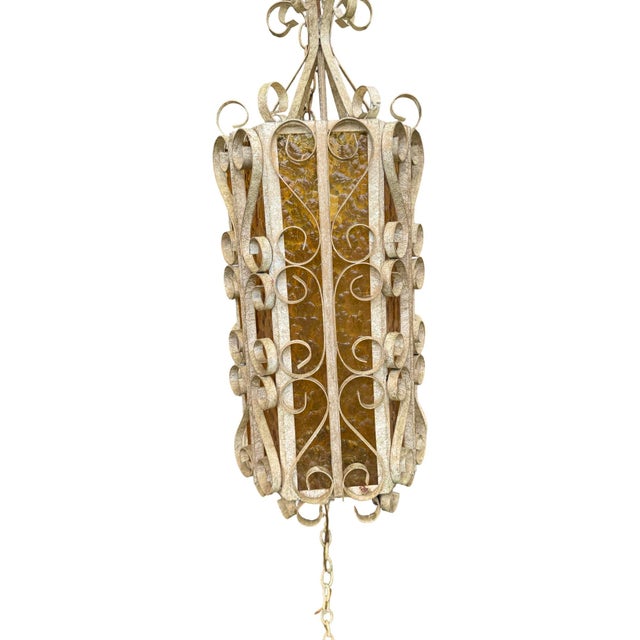 Striking vintage Hollywood Regency / Mediterranean Revival plug-in swag lantern, dating to approximately the late...
