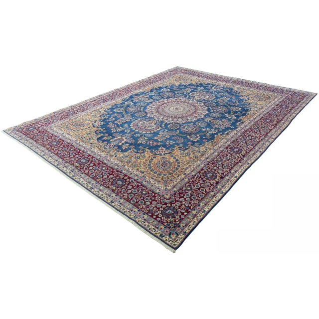 This elegant, hand-knotted Kerman Oriental rug captivates with its elaborate floral design and harmonious, classic color...