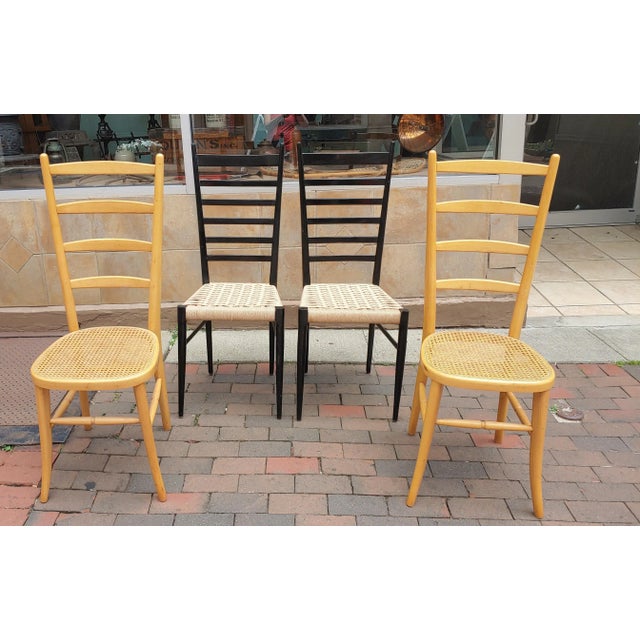Here's a nice collection of 4 Italian made imports from the Mid-Century period in the style of Gio Ponti. The ebony pair...