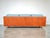 Presented here is a vintage mid century modern teak case sofa, designed in the manner of Milo Baughman. This beautiful...