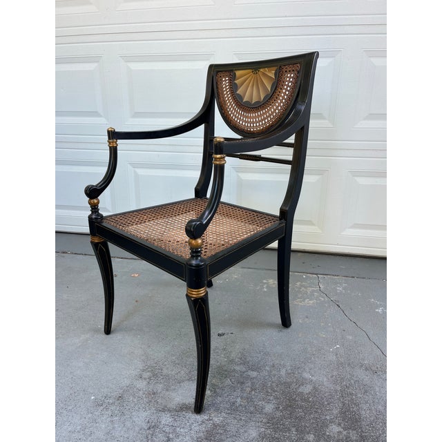 Vintage Regency Style Ebonized Armchair with Cane Seat 20th century Regency style armchair from the cabinet maker...