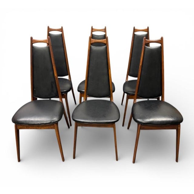 This is a set of 6 rare find high back dining chairs Attributed to Adrian Pearsall. They have solid, sculpted walnut...
