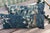 A handsome pair of decorative pillows upholstered in authentic 18th-century verdure tapestry, featuring an exceptionally...