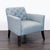 This West Elm lounge chair features a stylish light blue fabric with a tufted backrest and supportive armrests. The sturdy...