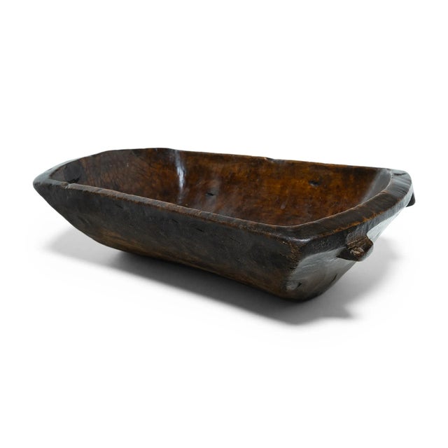 This early-20th century wooden tray from northern China charms with rustic texture and asymmetric form. Hand-carved from a...